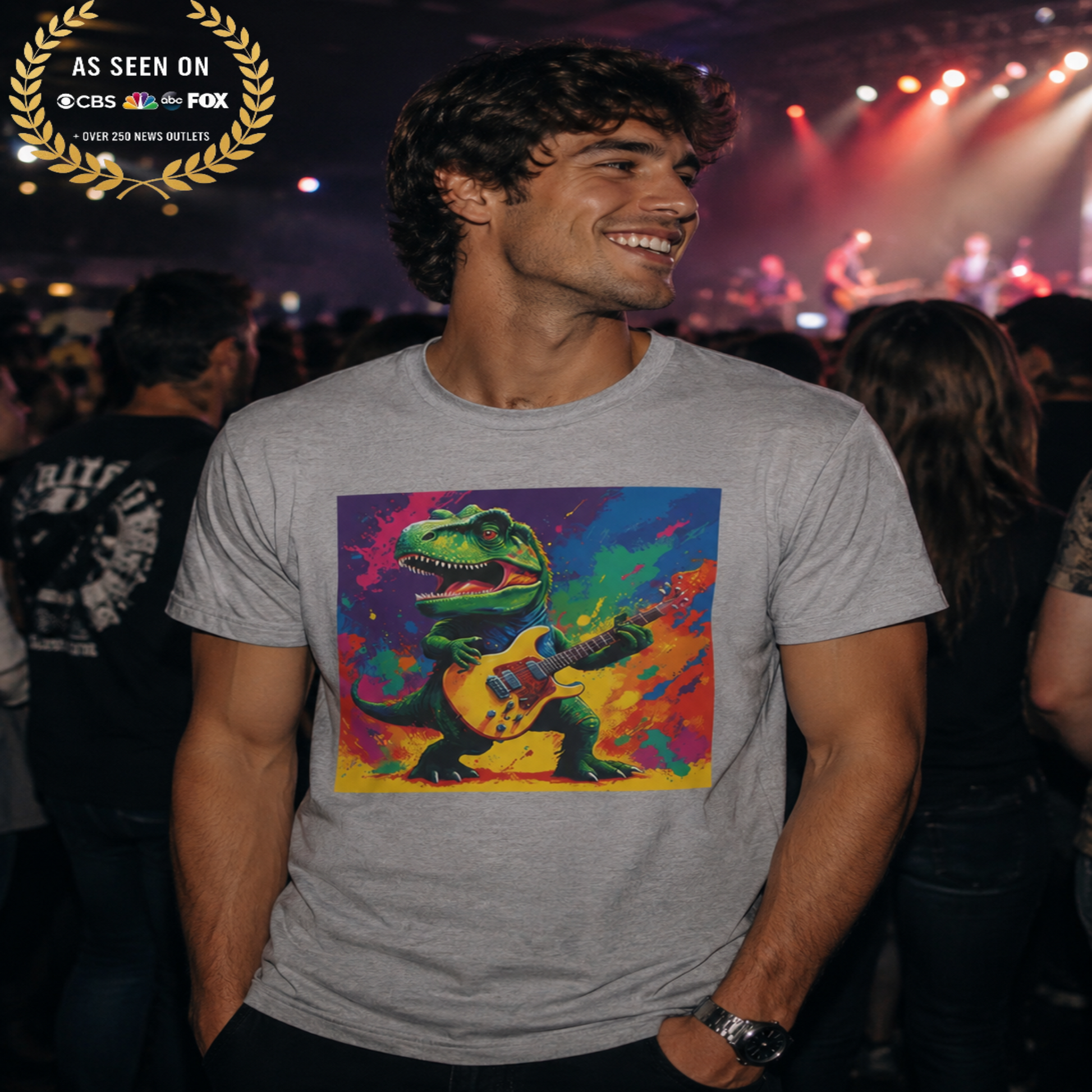 Man wearing a t-shirt with a colorful dinosaur playing guitar design at a concert.